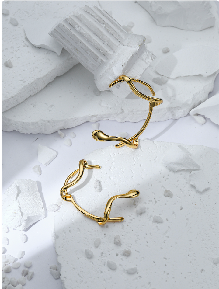 2. CyberVanguard- Gold Flow Ear Clip