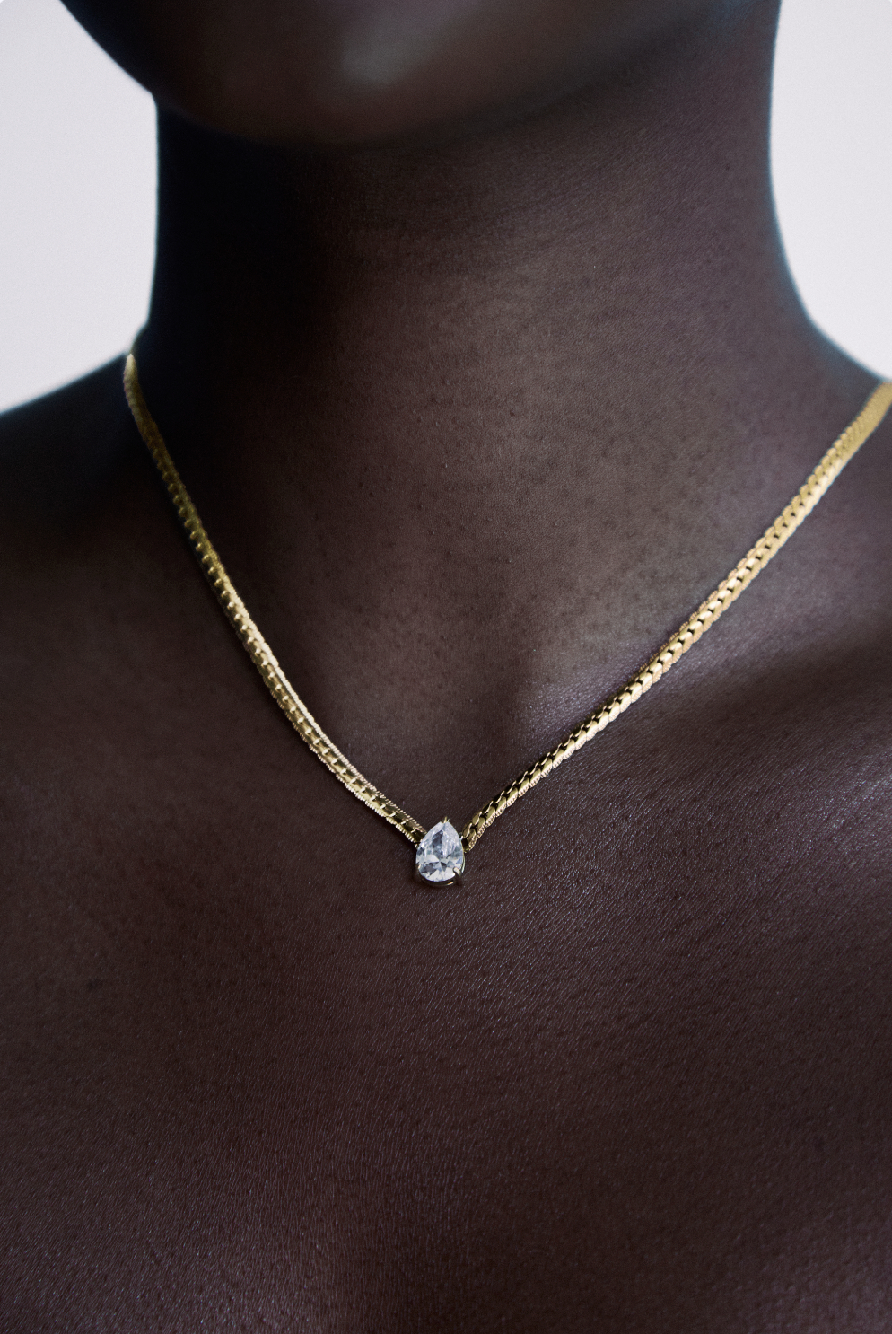 The Serene Drop: Minimalist Pear-Cut Solitaire Necklace - 18K Gold Plated Brass